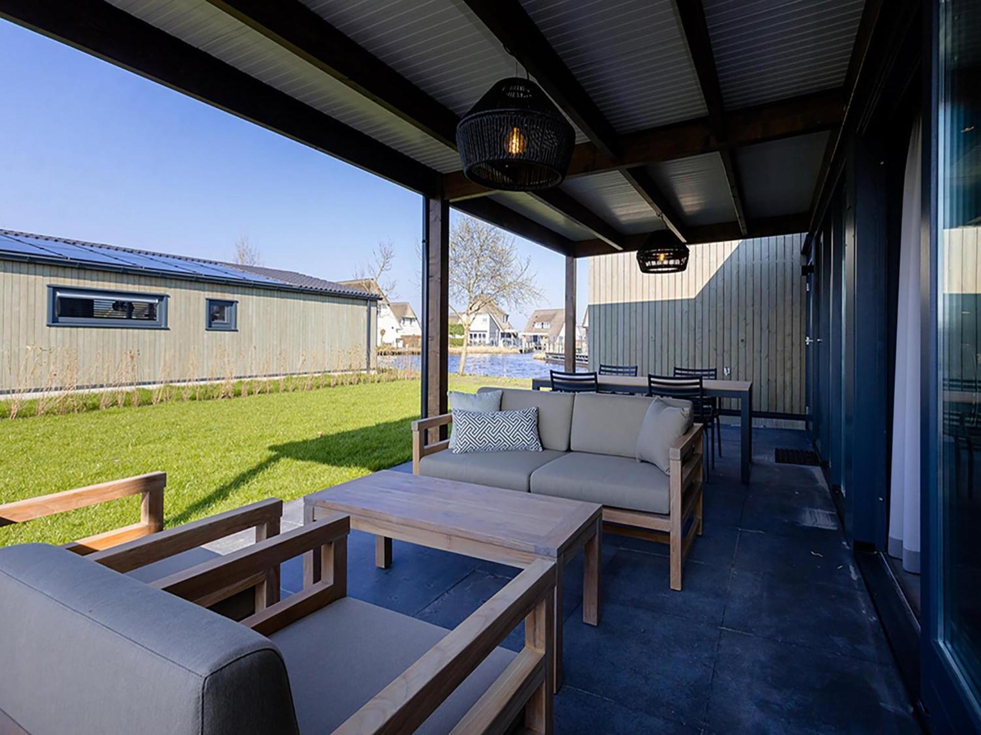 Luxury Docklodge On The Water Delfstrahuizen Exteriör bild